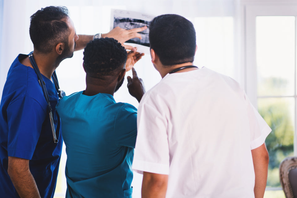 Doctors looking at an X-ray together